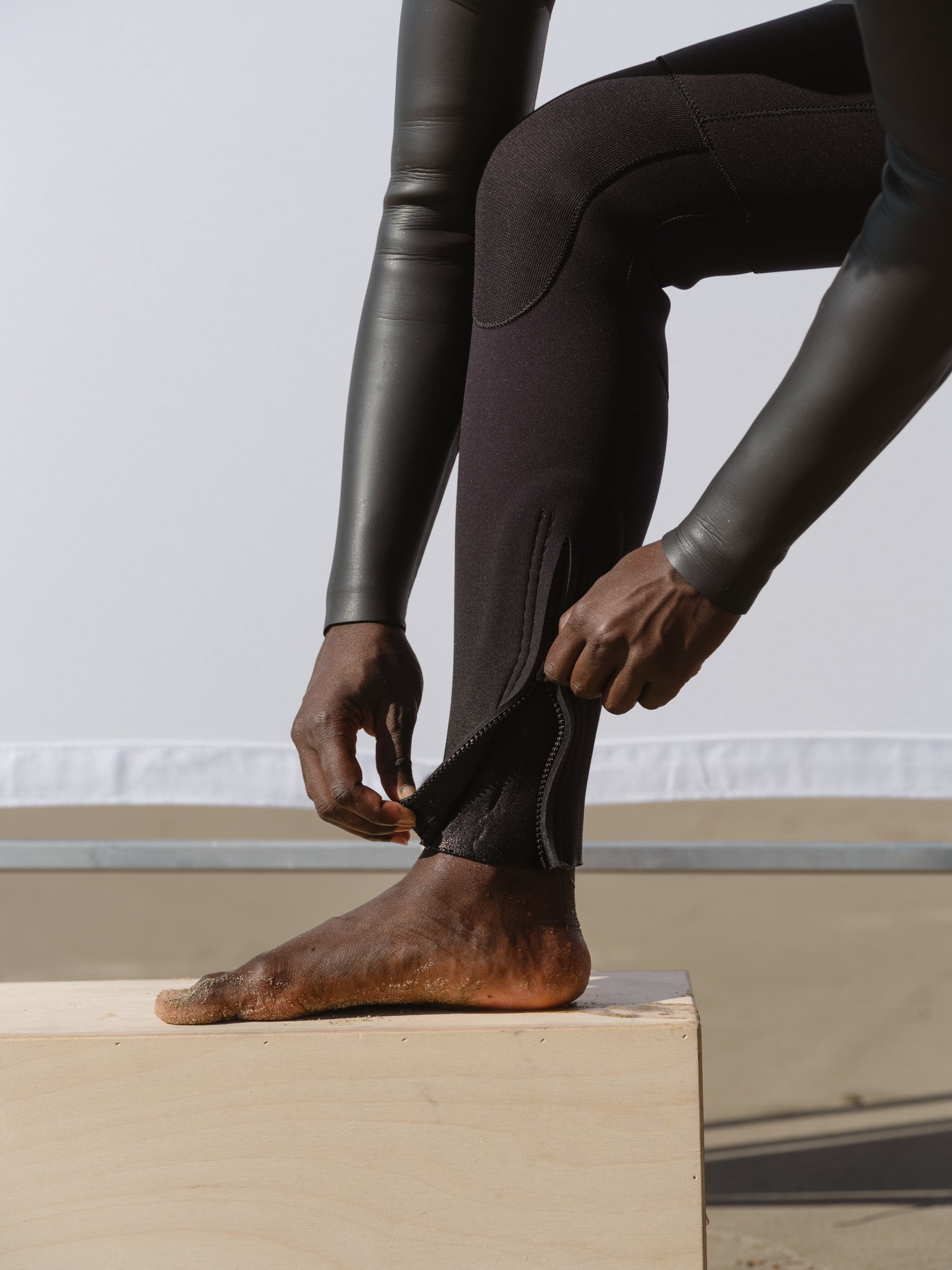 Basalt smoothskin wetsuit ankle zipper detail for easier entry and exit